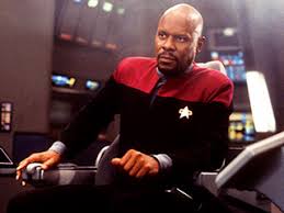 Captain Benjamin Sisko portrayed by Avery Brooks